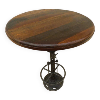 Unique bistro table with its adjustable industrial cast iron leg