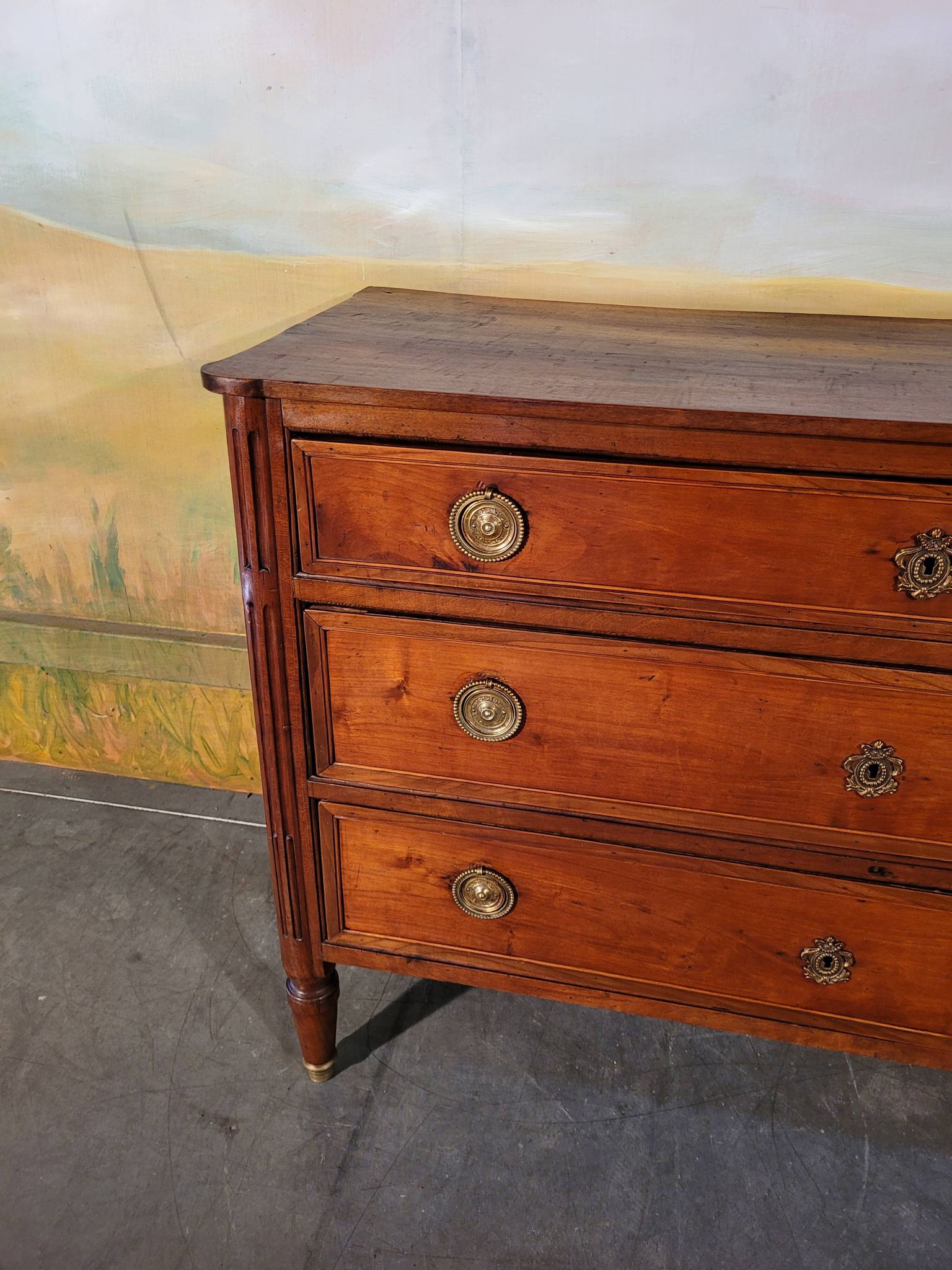 Small Louis XVI period chest of drawers in cherry wood