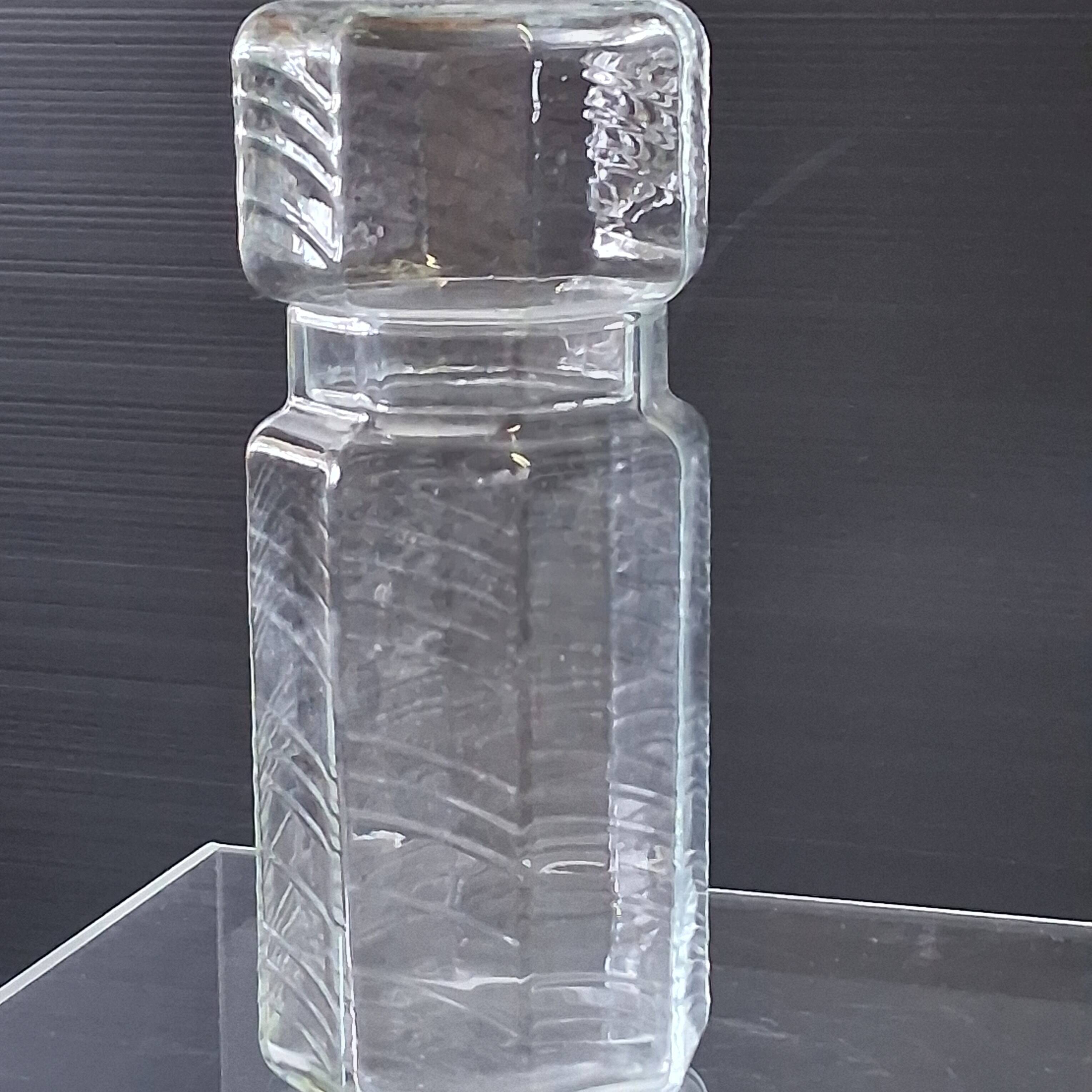 Set of 3 glass jars with old transparent lids in very good condition.