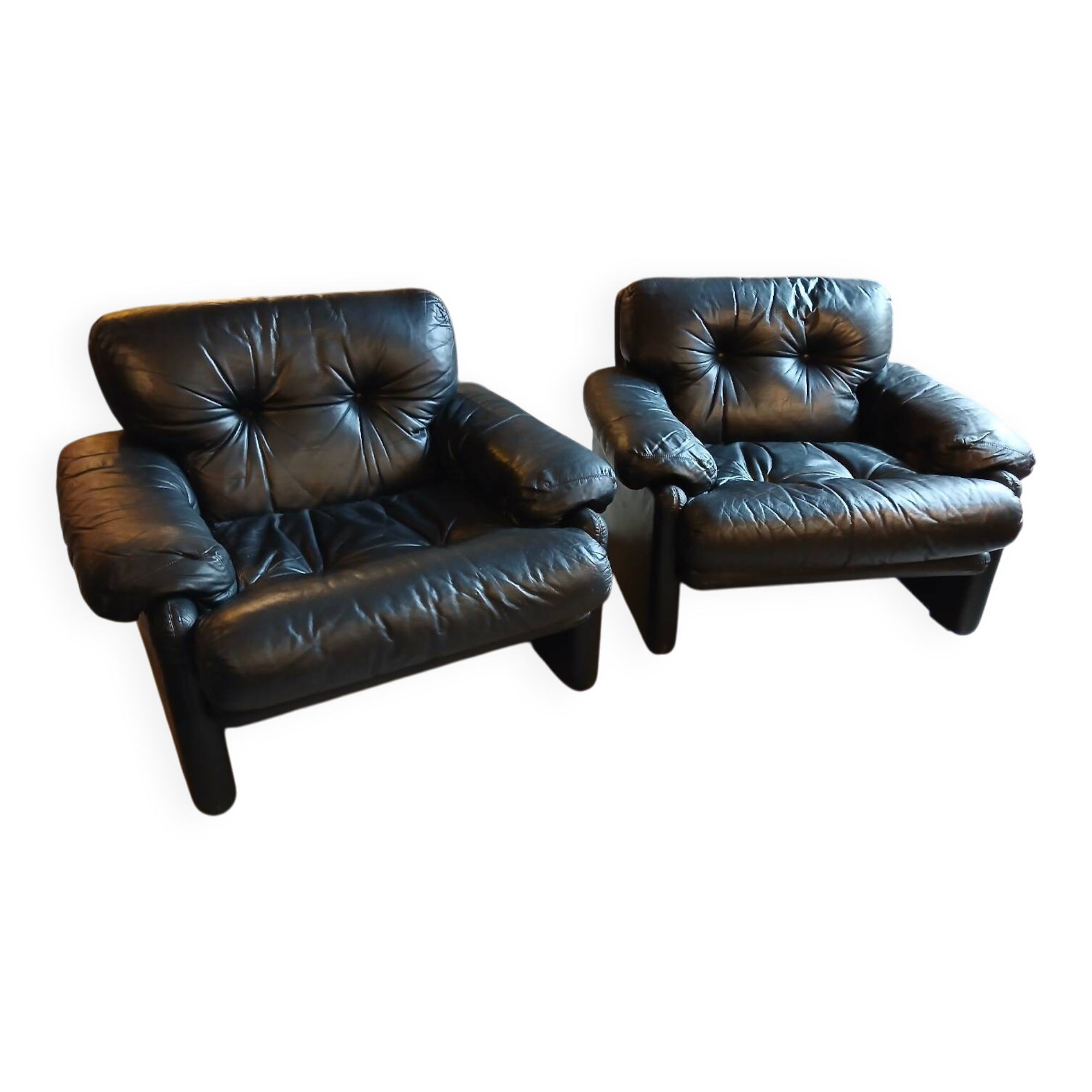 Pair of designer leather armchairs by Tobia Scarpa