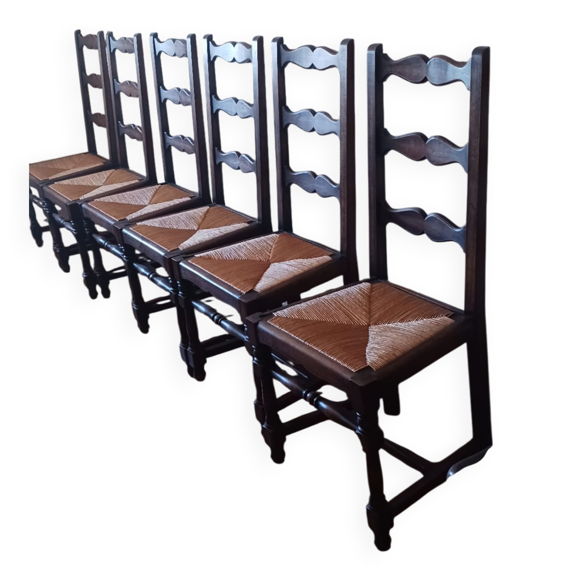 6 wooden and straw chairs