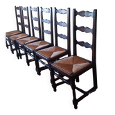 6 wooden and straw chairs