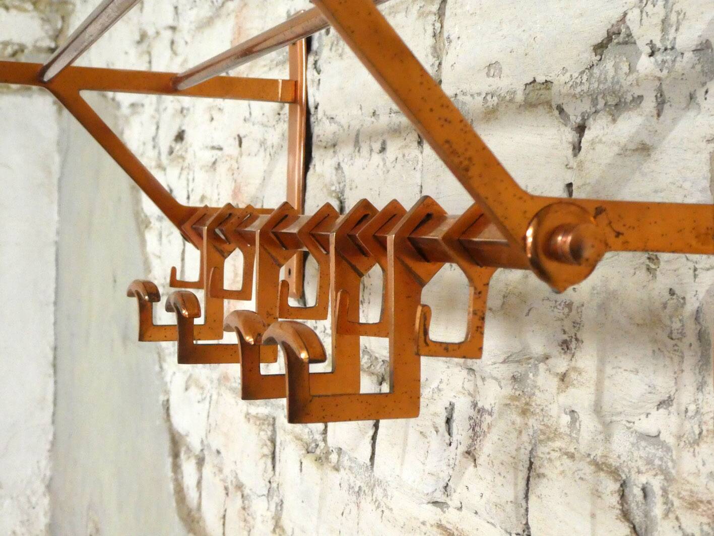Copper cloakroom coat rack, 1930