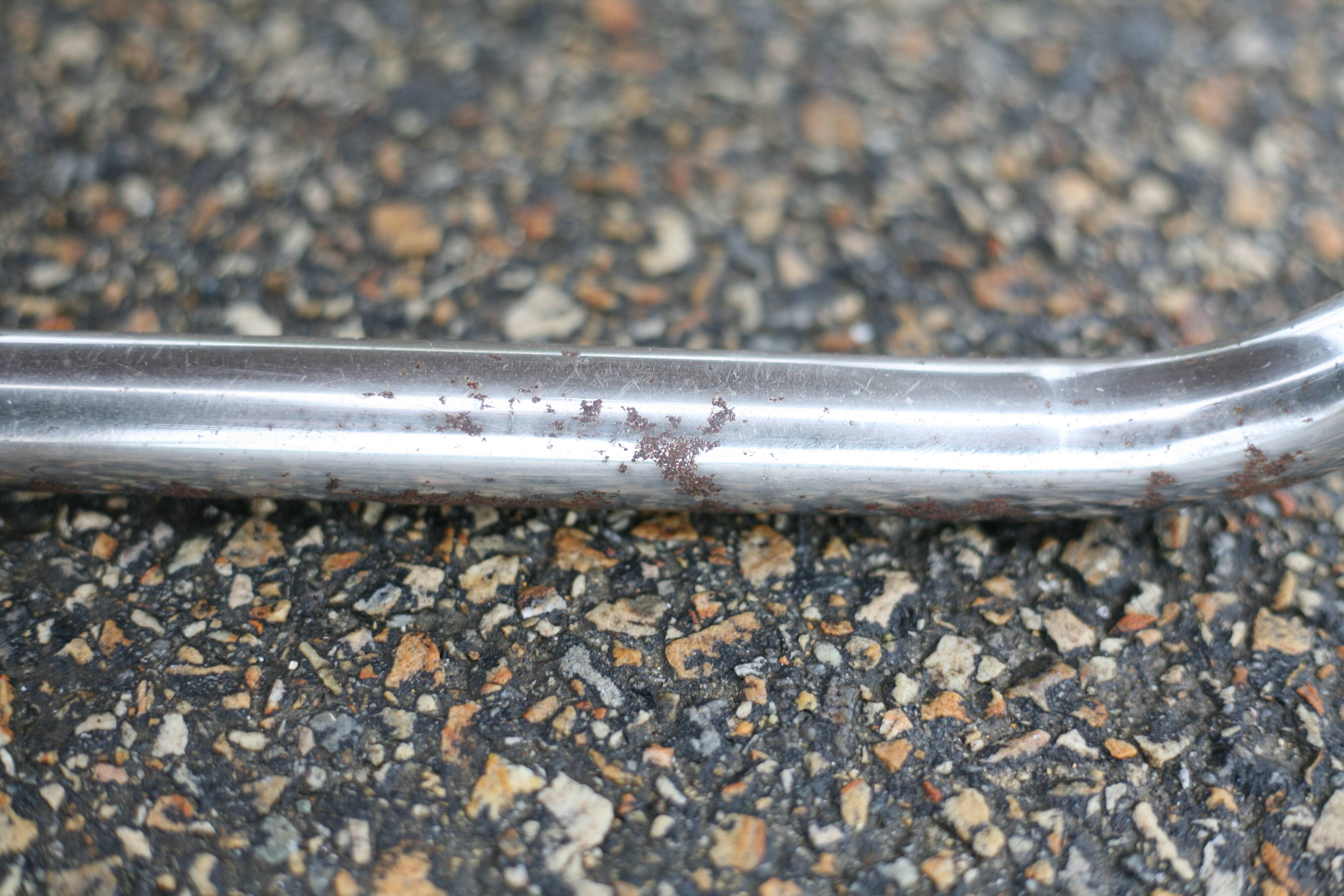 4 armchairs forming a modular sofa. Steel, imitation leather, 70s