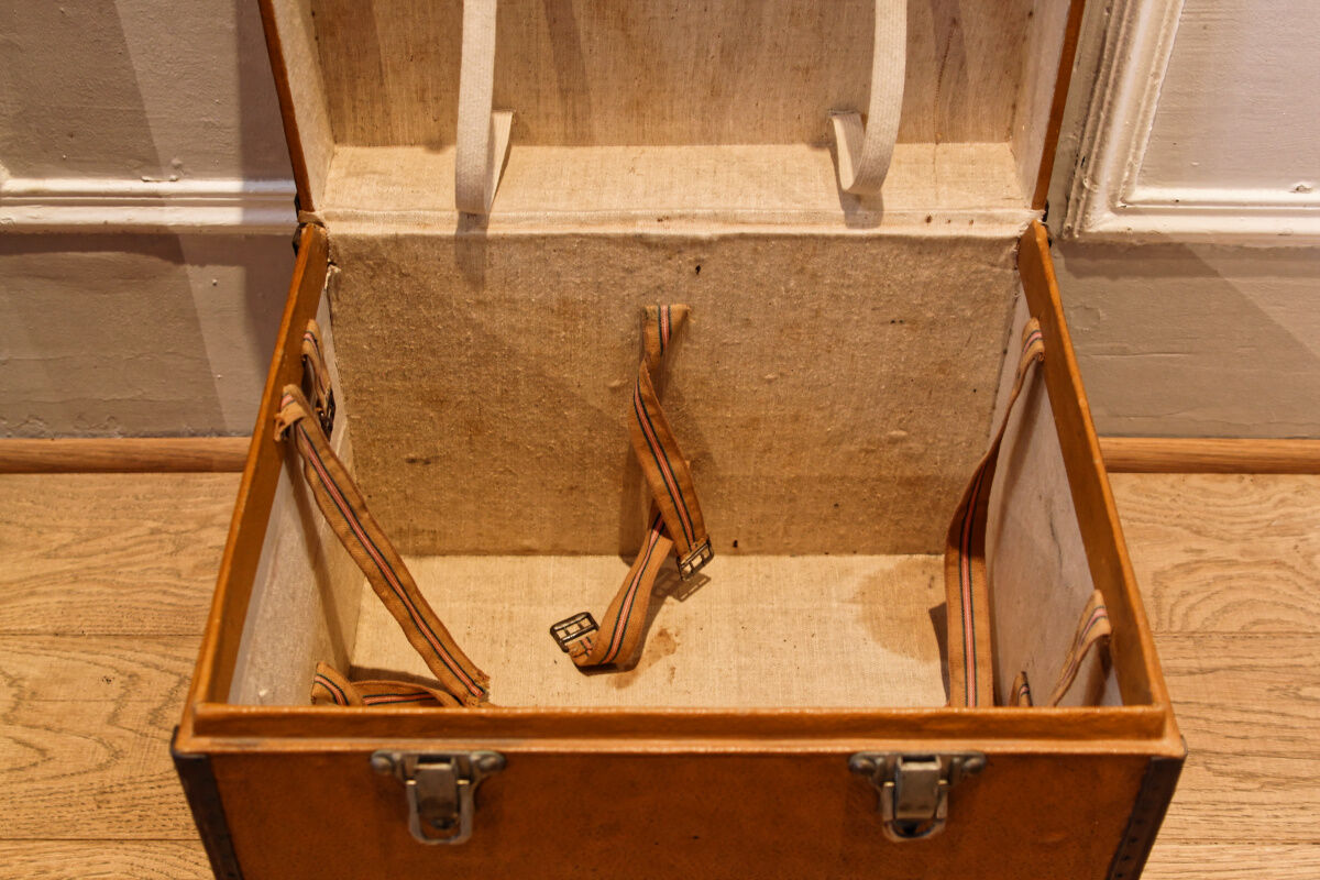 Leather and brass hat malle