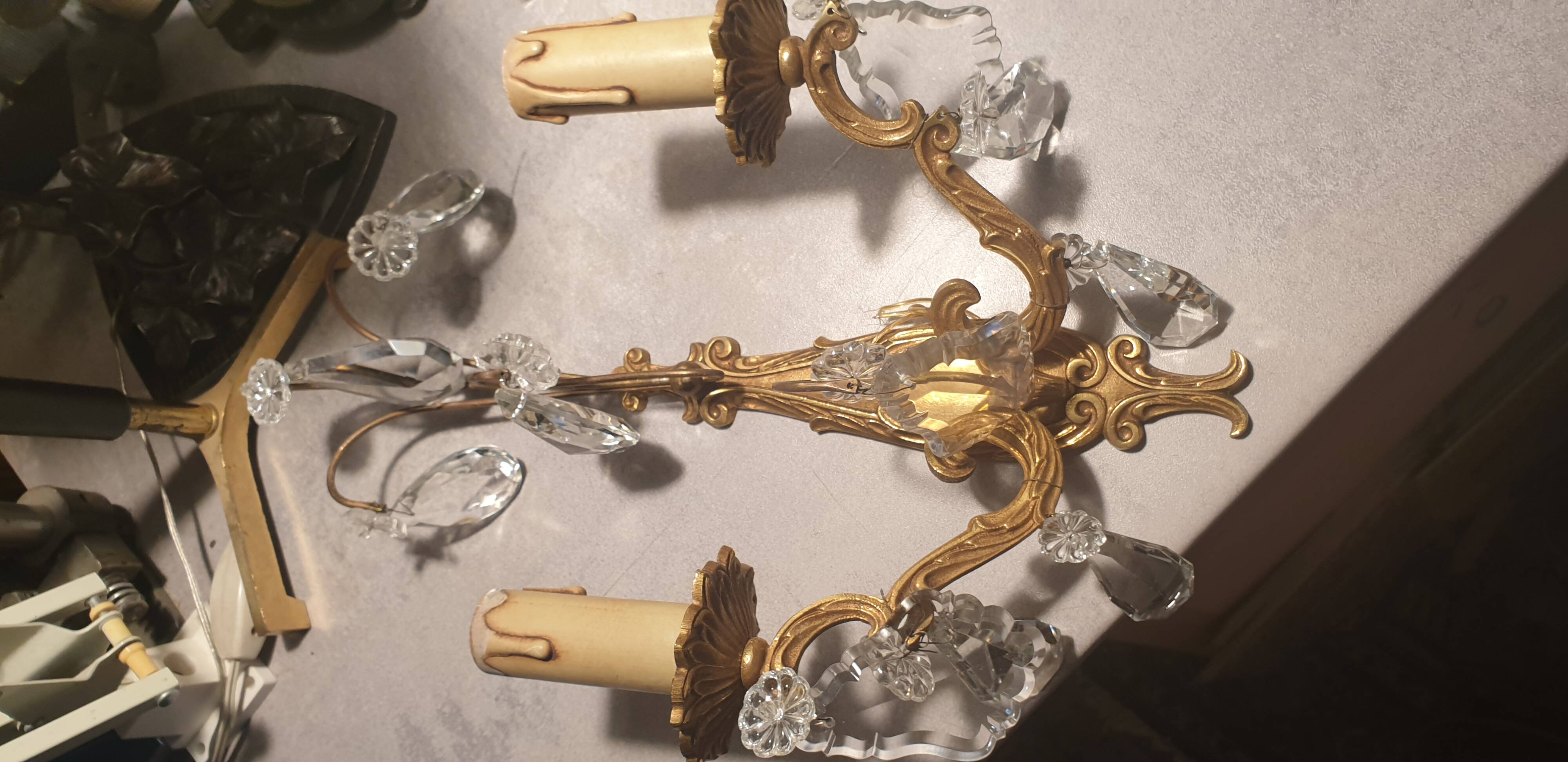 1 crystal prism wall light with 2 lights. Brass frame