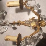 1 crystal prism wall light with 2 lights. Brass frame