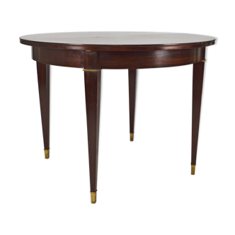 Art Deco mahogany round table by Jacques Adnet, circa 1940