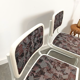 Pair of vintage tubular frame dining chairs