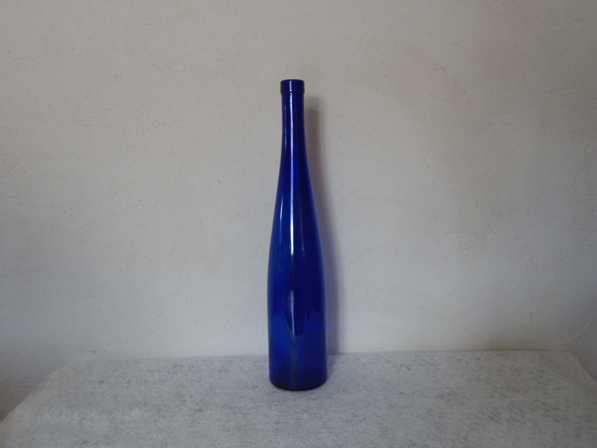 Blue transparent glass bottle
