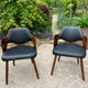 Pair of wooden armchairs
