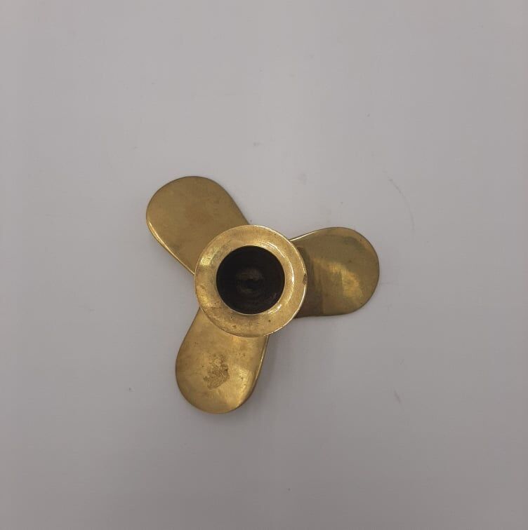 Brass propeller candle holder