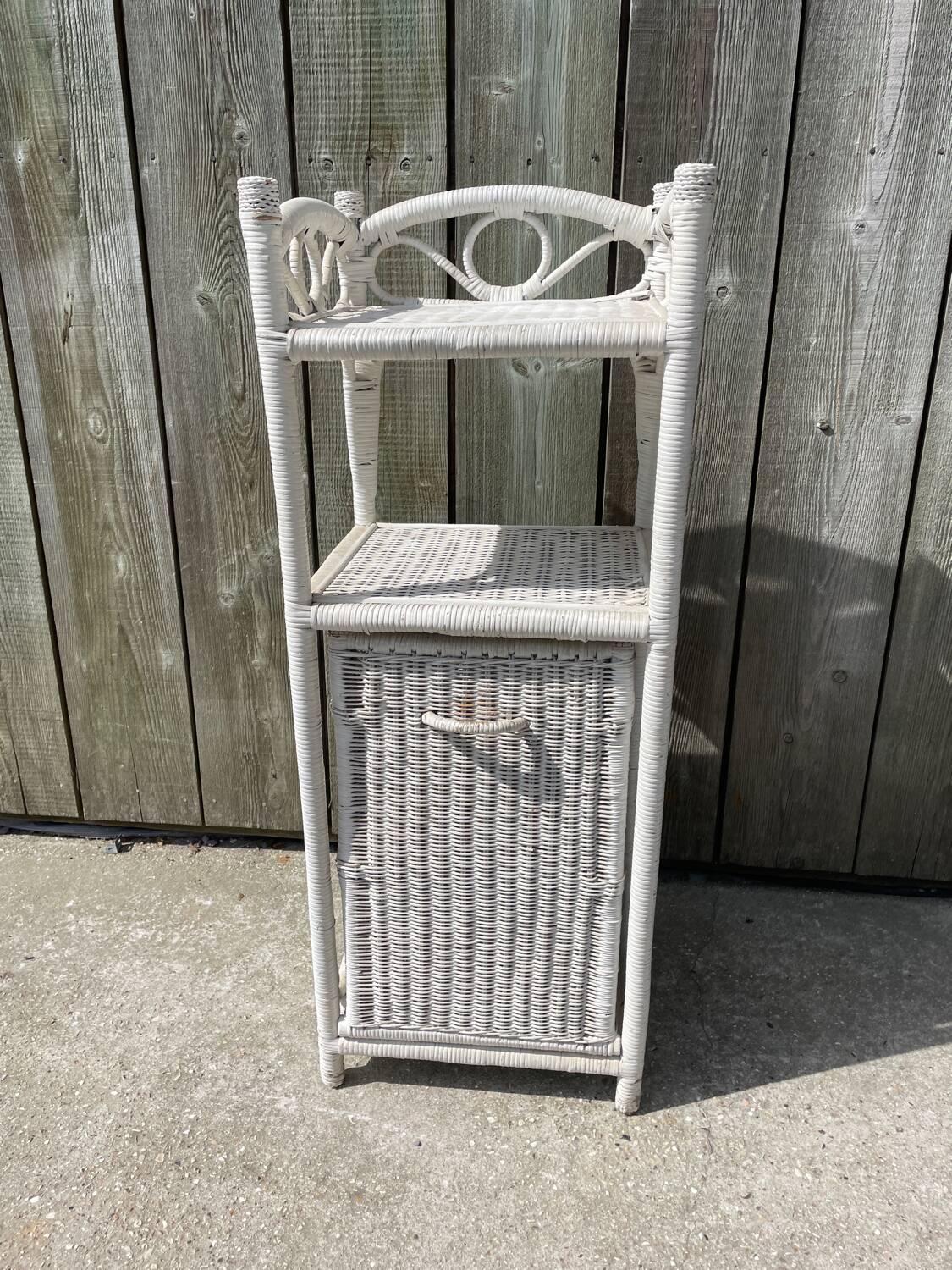 Small white wicker bathroom shelf
