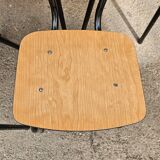 Chairs in black and light brown formica