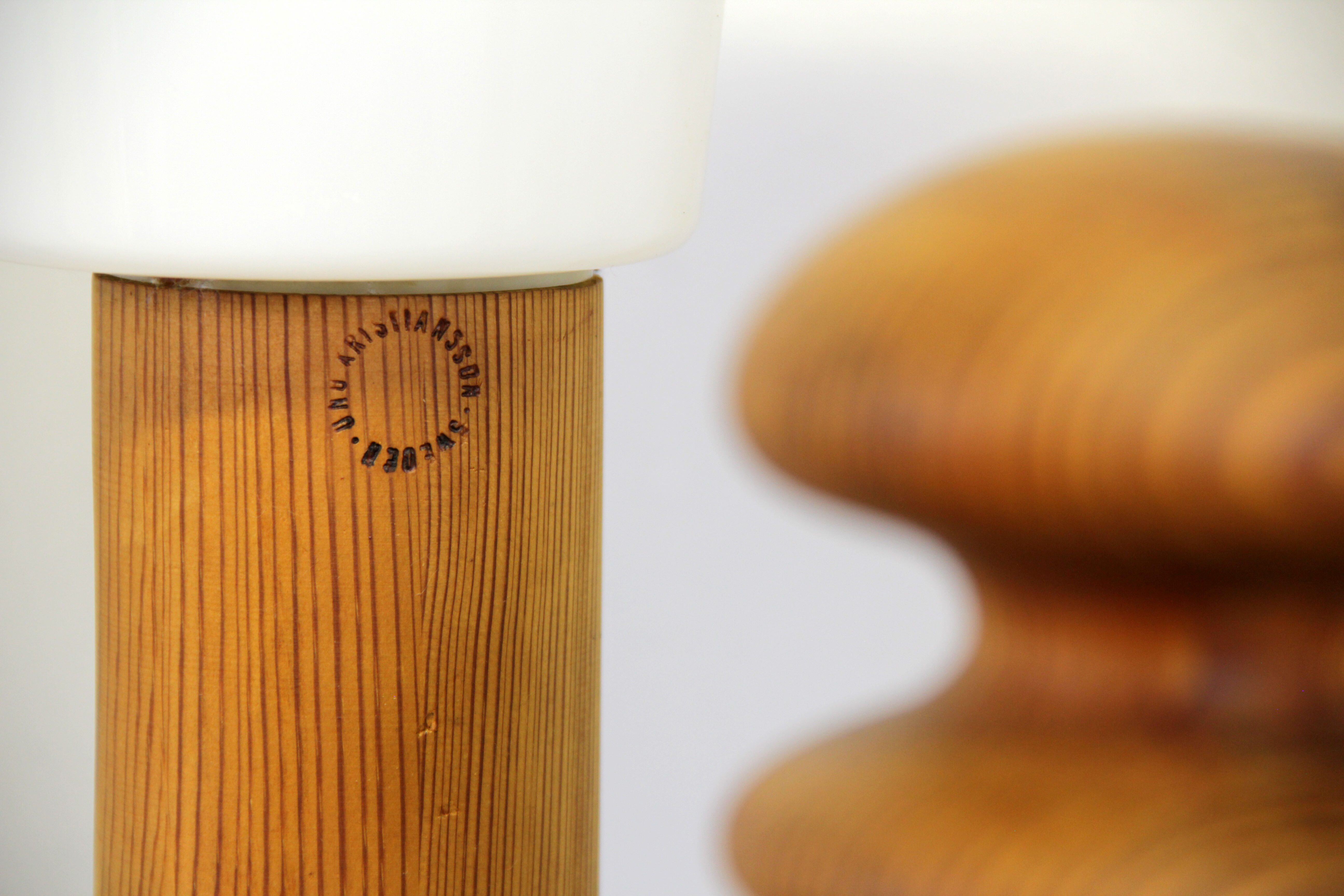 Turned solid pine floor lamp by Uno Kristiansson for Luxus Sweden, 1970s