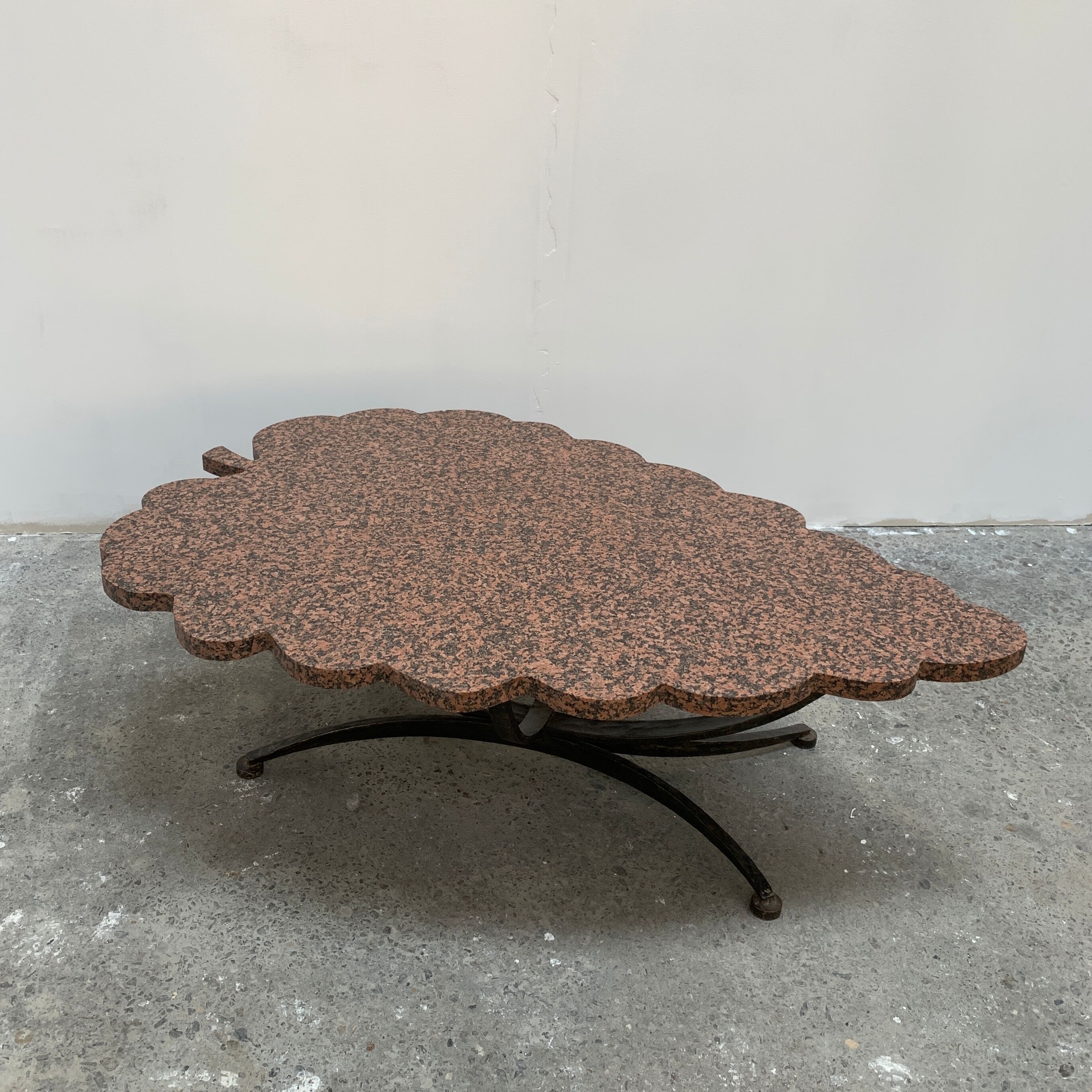 Granite and hammered wrought iron coffee table