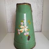 Green broc in enamelled sheet metal with floral patterns