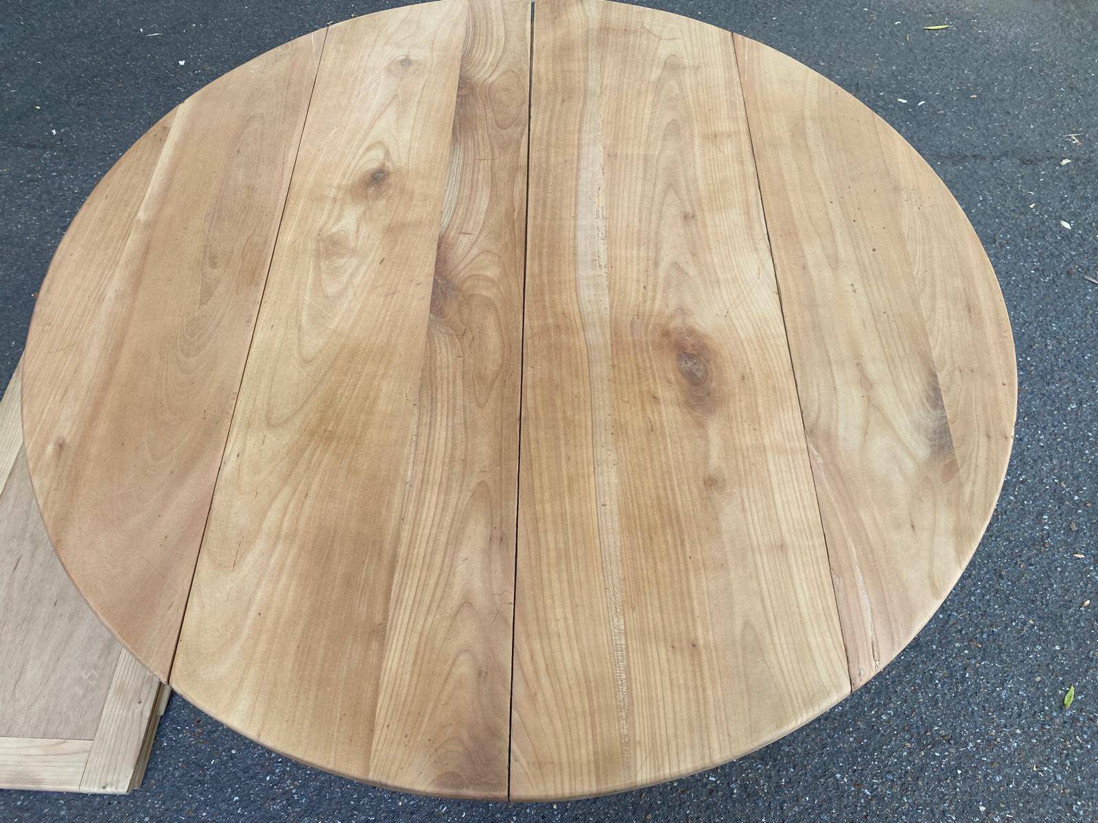 Table à manger ronde extensible à volets décapée en noyer brut 2 rallonges