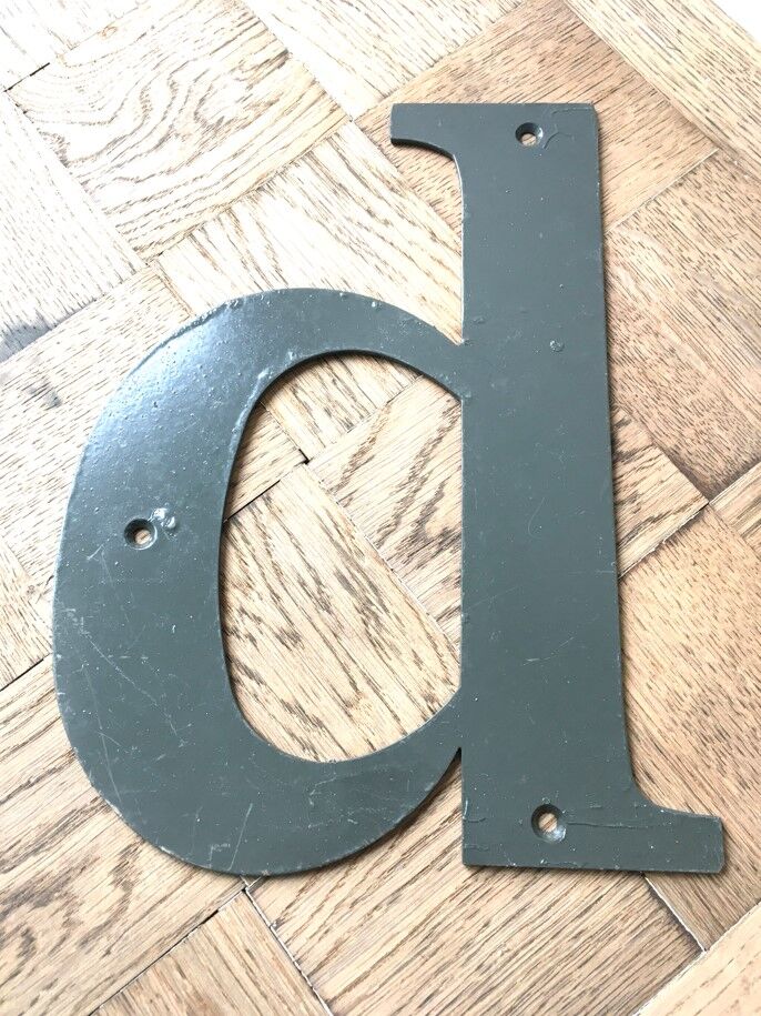 Vintage metal industrial letter D
