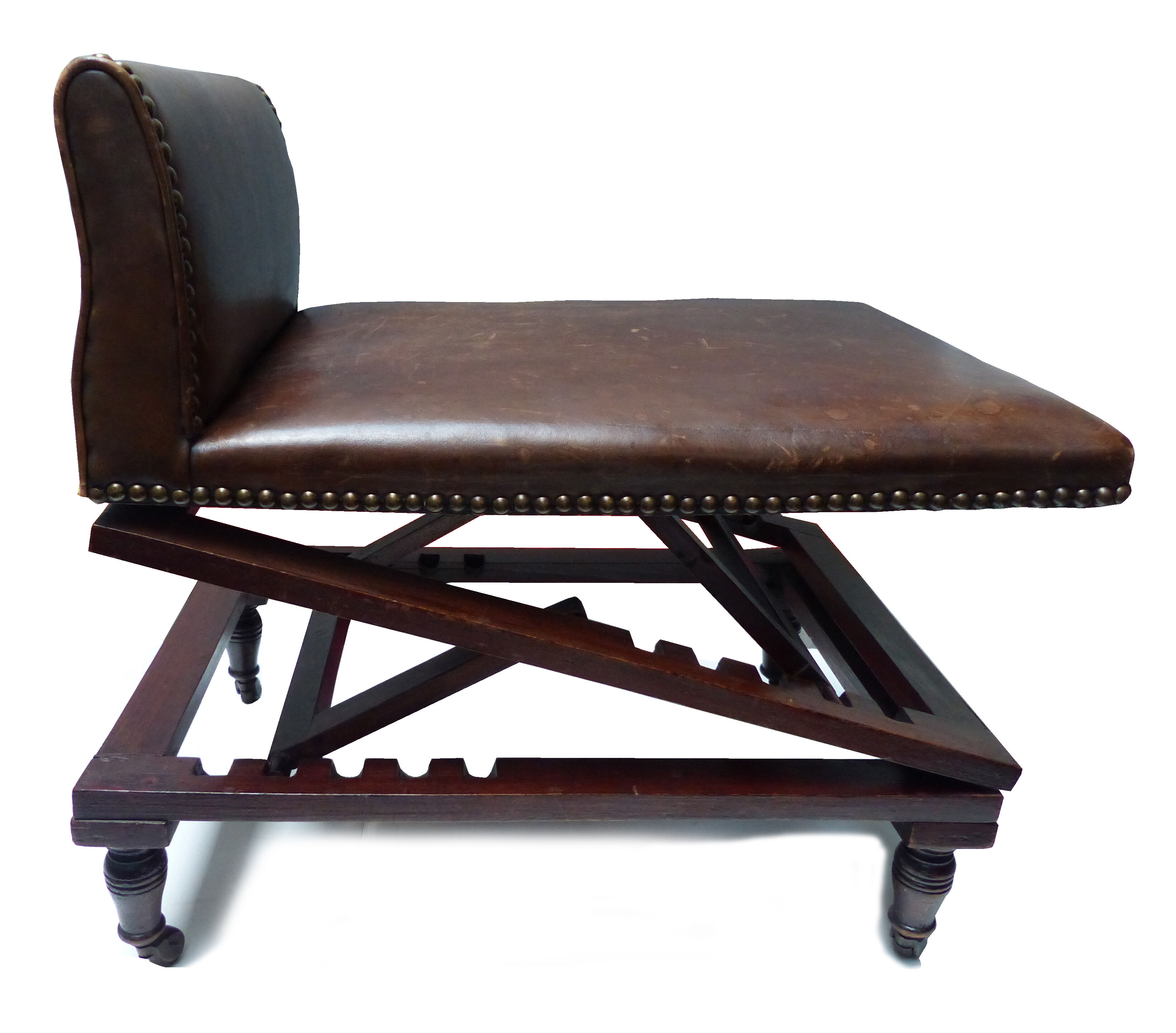 Old adjustable chair in wood and leather