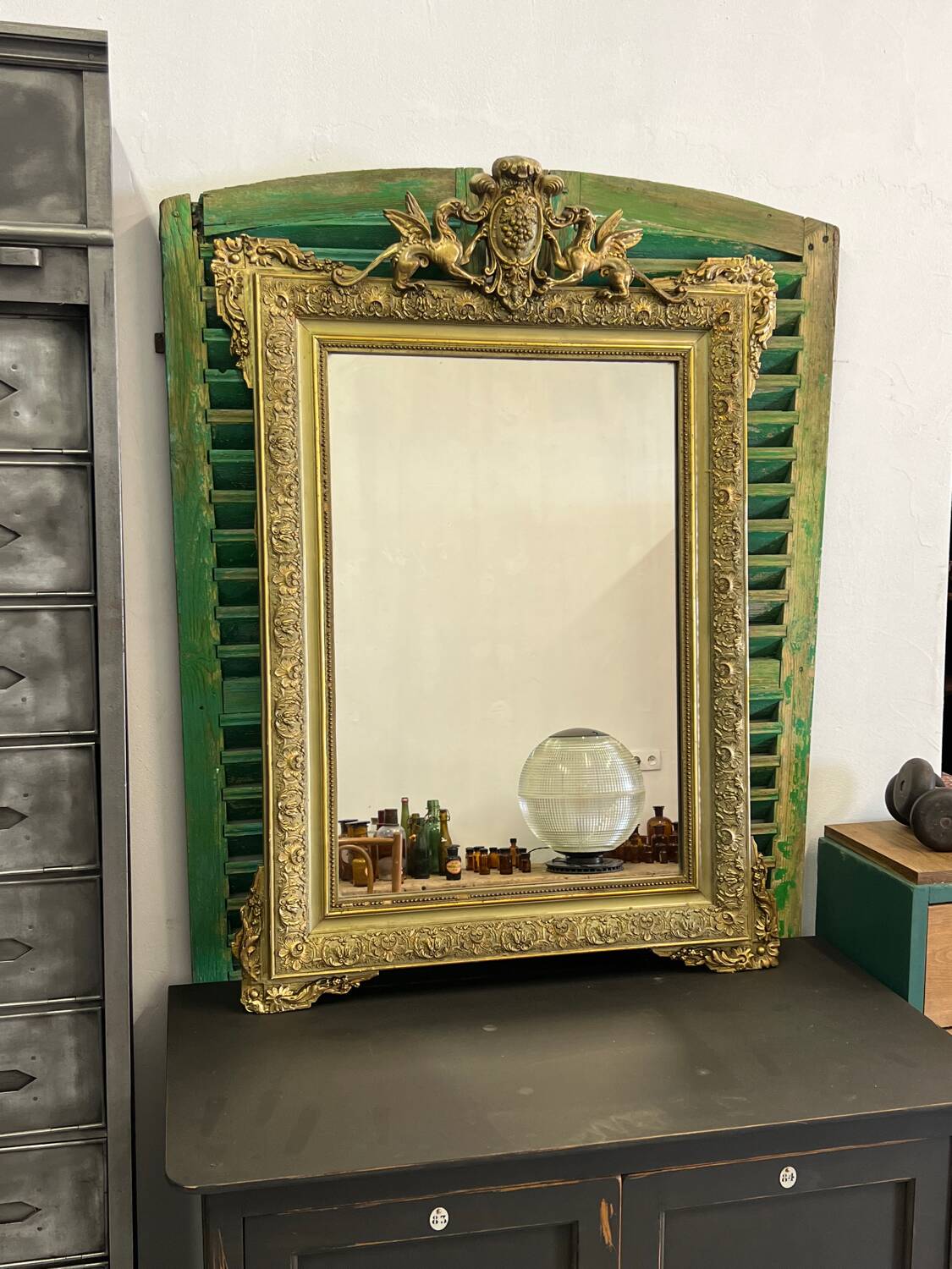 Old Napoleon III mirror decorated with a griffin