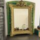 Ancien miroir Napoléon III a décor de griffon