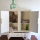 Kitchen cabinet or pharmacy in art deco wood