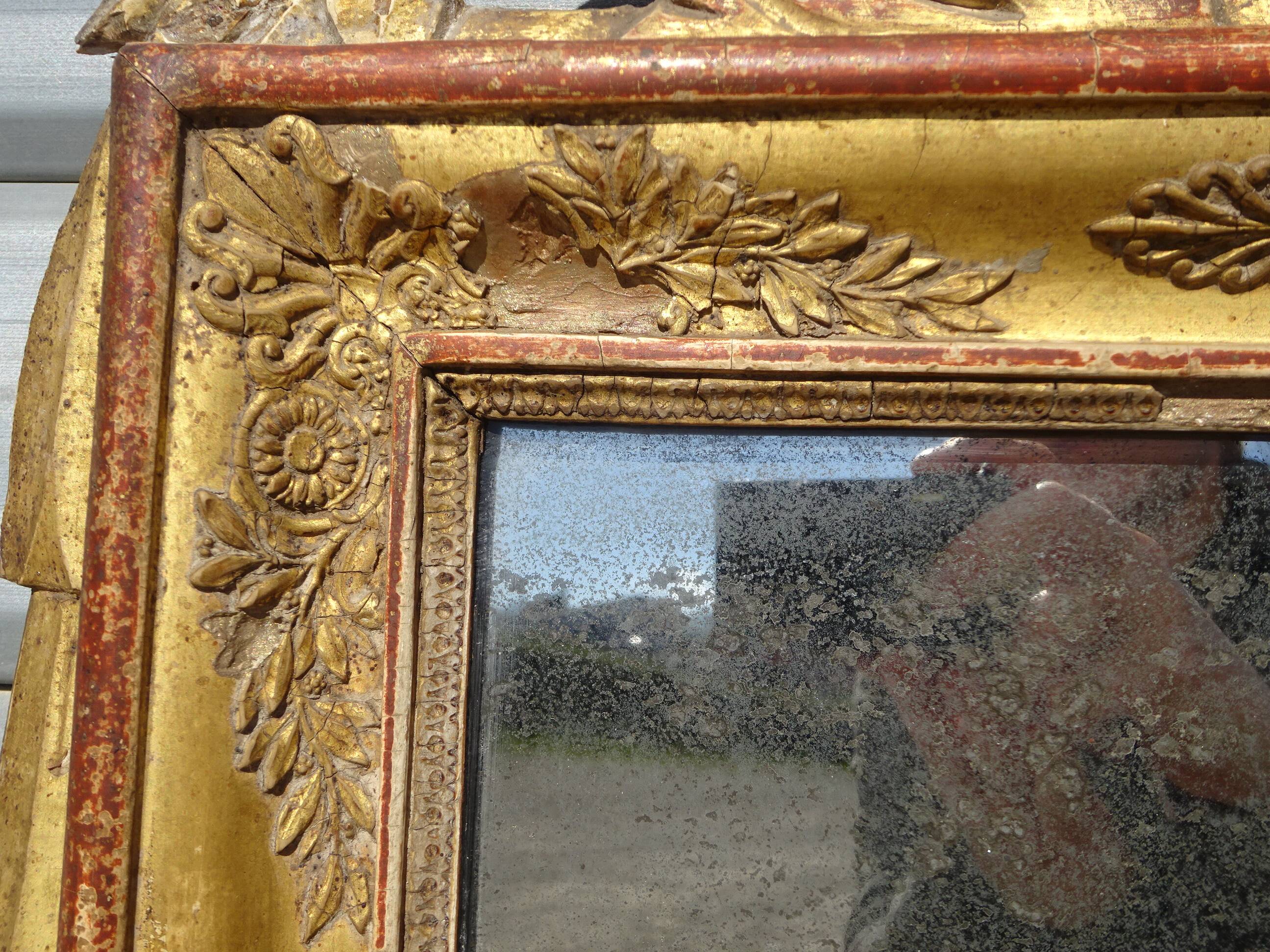 Very old Louis XVI style mirror.