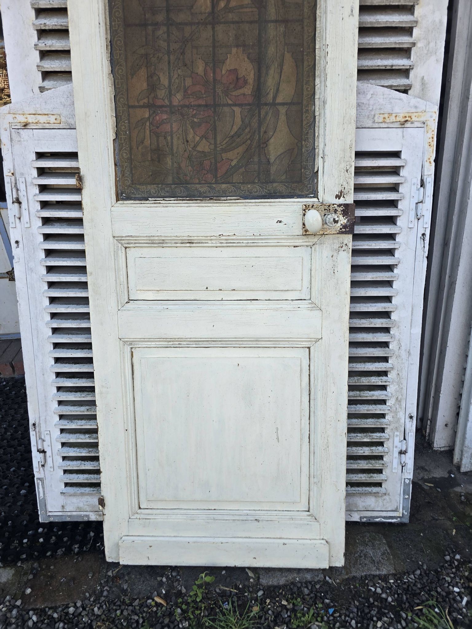 old door with decorated window
