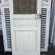 old door with decorated window