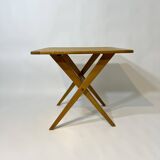 Vintage design solid wood folding scissor table from the 1970s