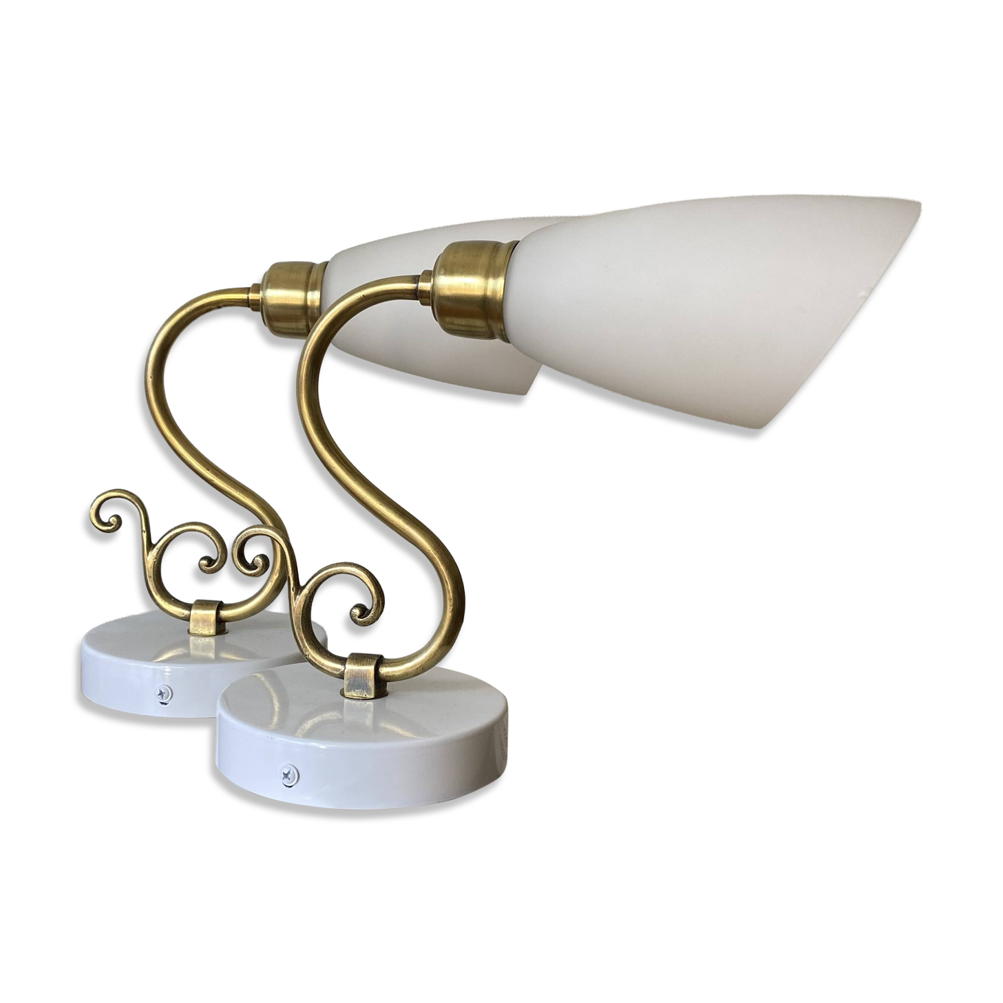 Pair of brass swan neck wall lights with white glass shades.