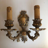 Pair of Louis XV style two-branch gilt bronze wall lights, small format and in good condition. Height 18 Width 20 cm