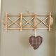 Vintage rattan wall coat rack