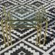 Nested table in gold metal and glass