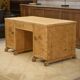 English desk in birch veneer with bee pattern marquetry from the 1950s.
