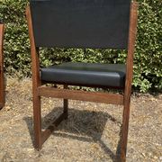 Set of 6 vintage teak chairs with black Skaï.
