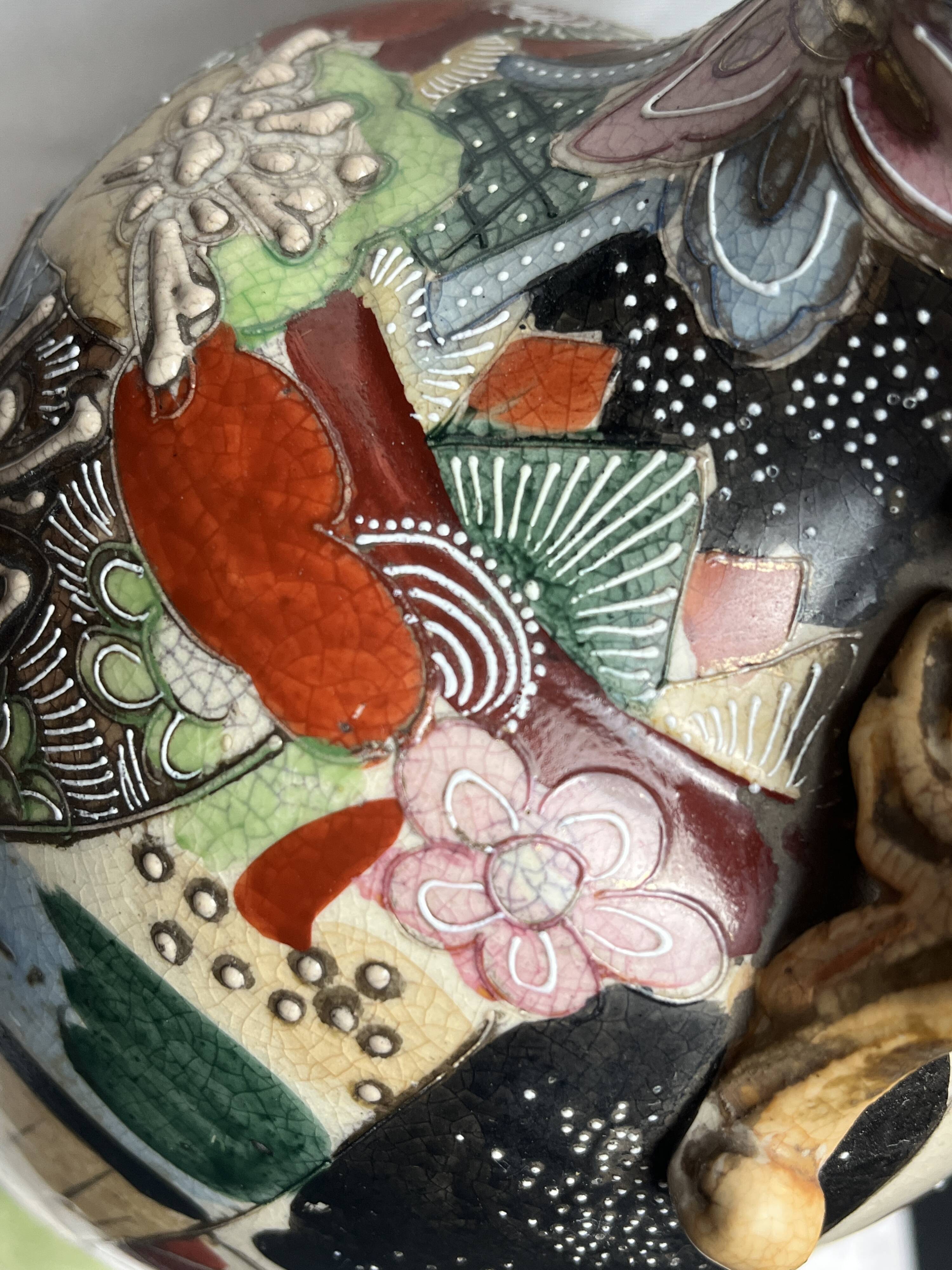 Japan, Satsuma vase with richly decorated handles, signed, early 20th century