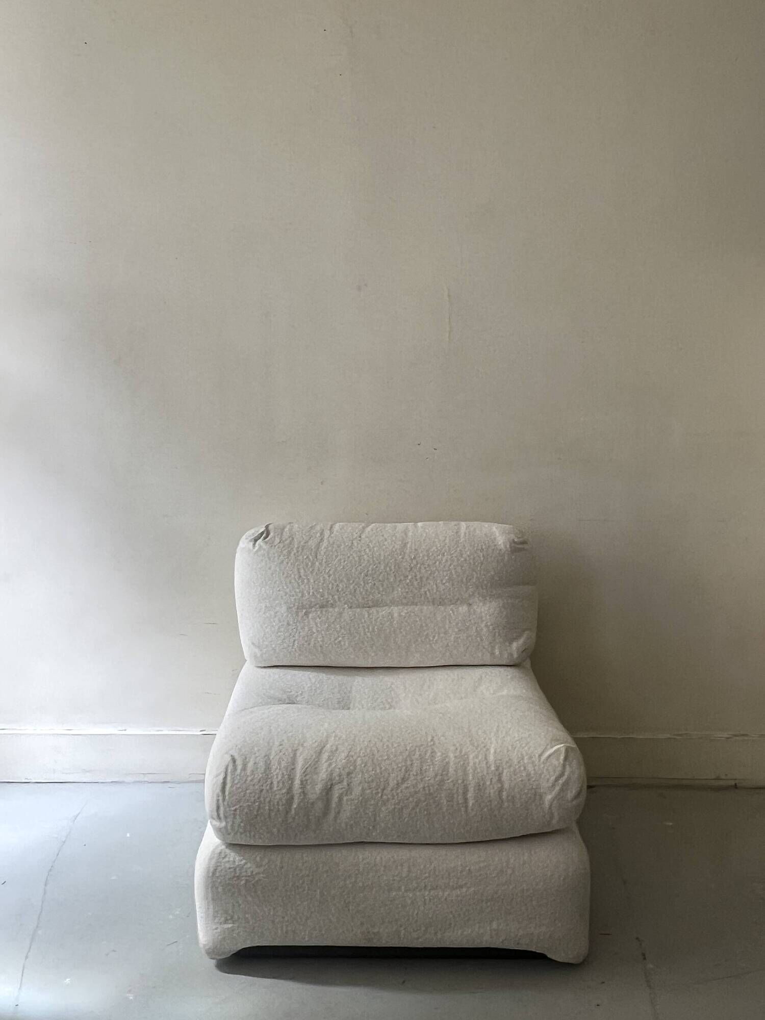 2 Italian off-white chenille armchairs with wooden base, 1970s design.