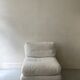 2 Italian off-white chenille armchairs with wooden base, 1970s design.
