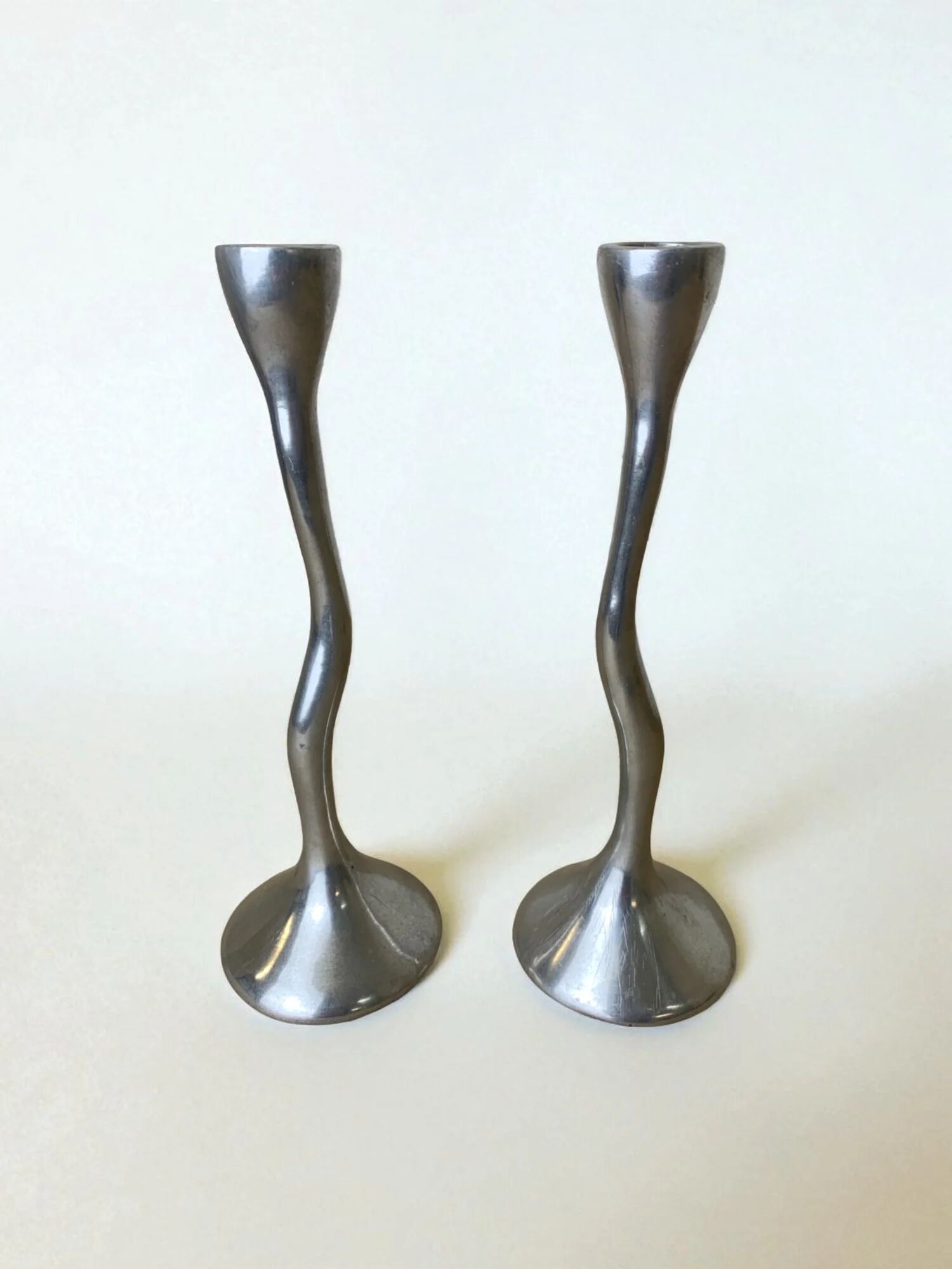 Pair of zigzag candlesticks, solid aluminium, Spain, circa 1980s