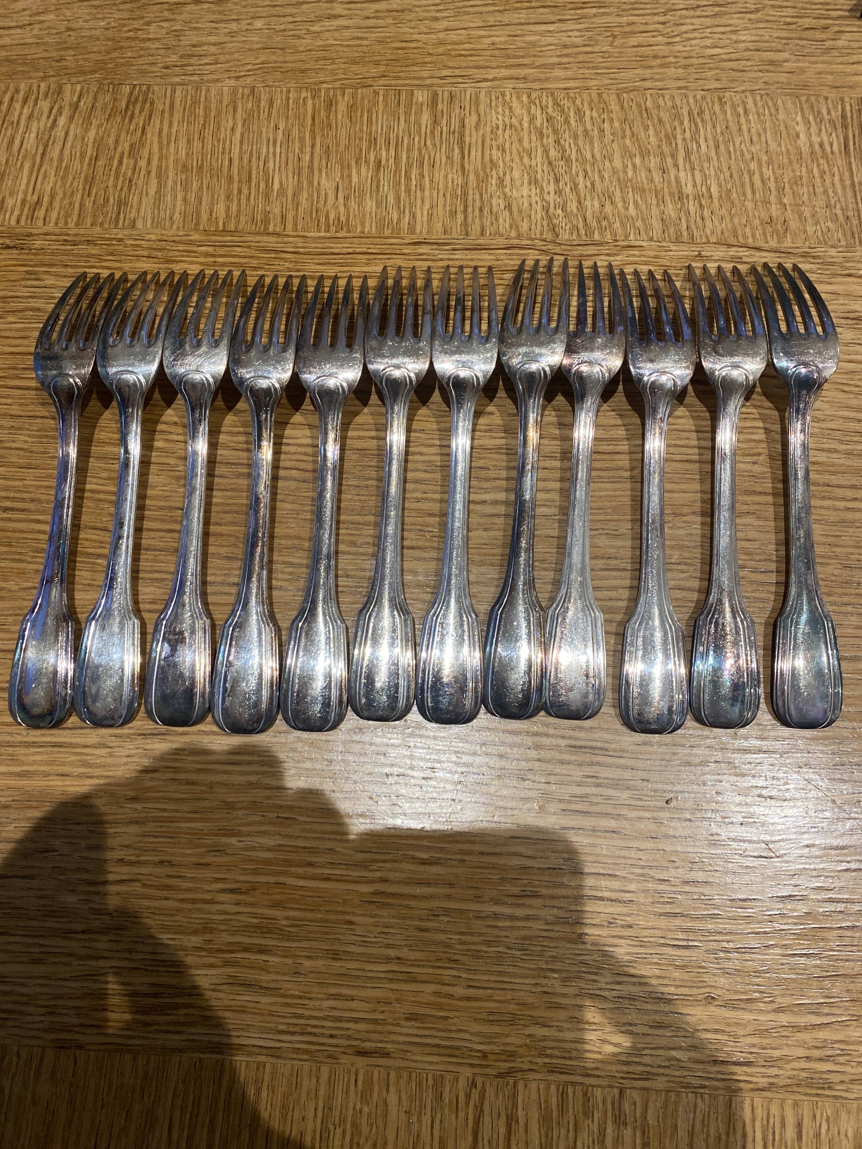 12 large silver metal forks