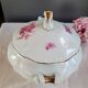 Soup tureen, gravy boat and serving dishes