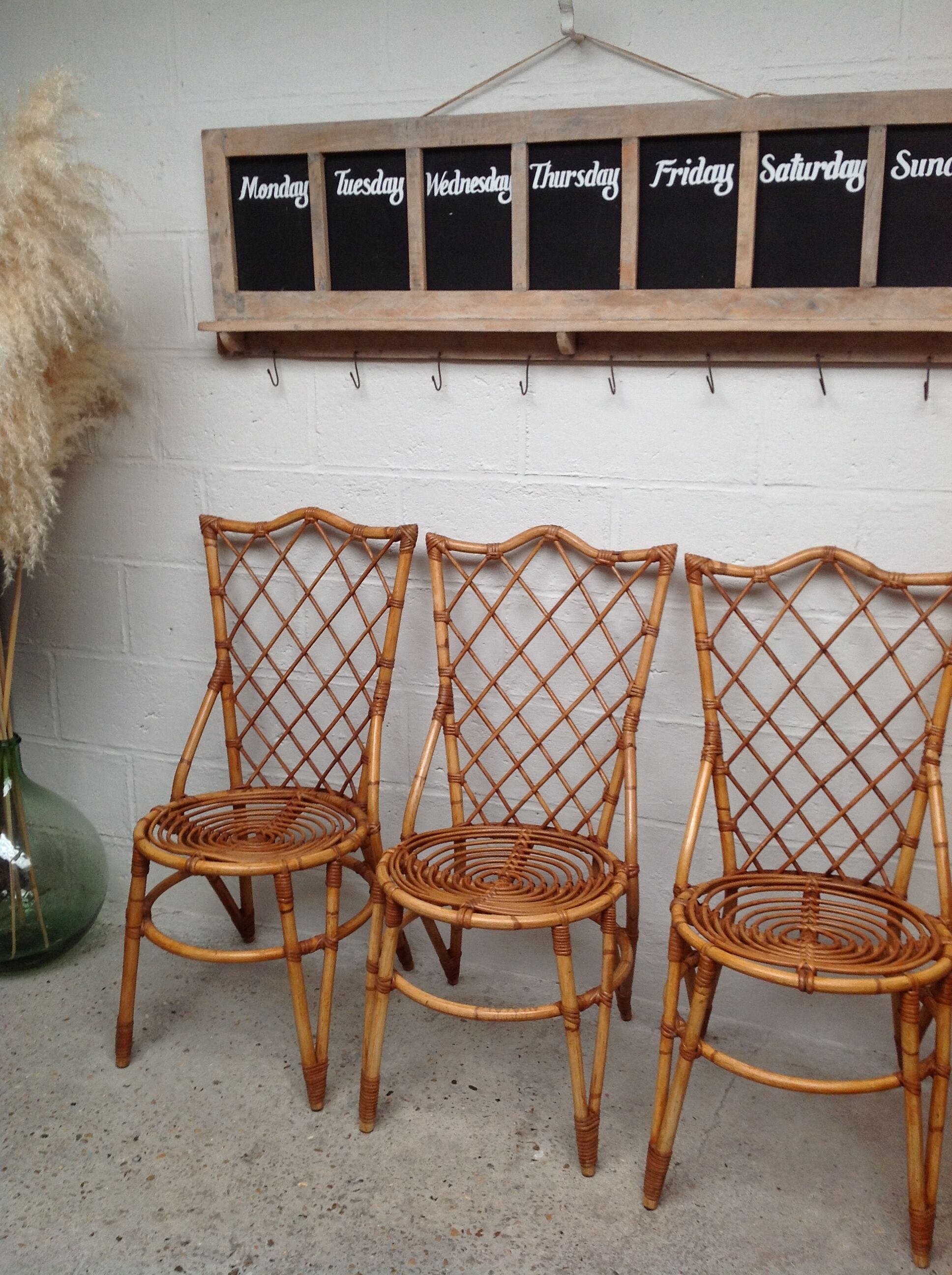 Rattan chairs by Louis Sognot