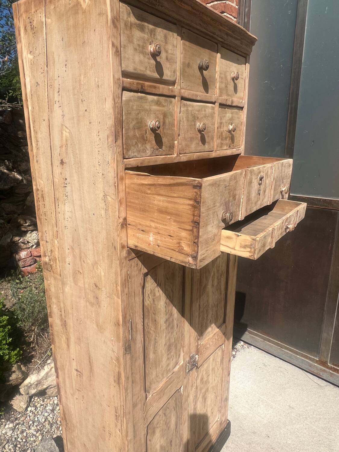 Beautiful piece of furniture with 8 drawers/2 doors in raw wood.