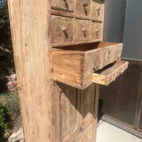 Beautiful piece of furniture with 8 drawers/2 doors in raw wood.