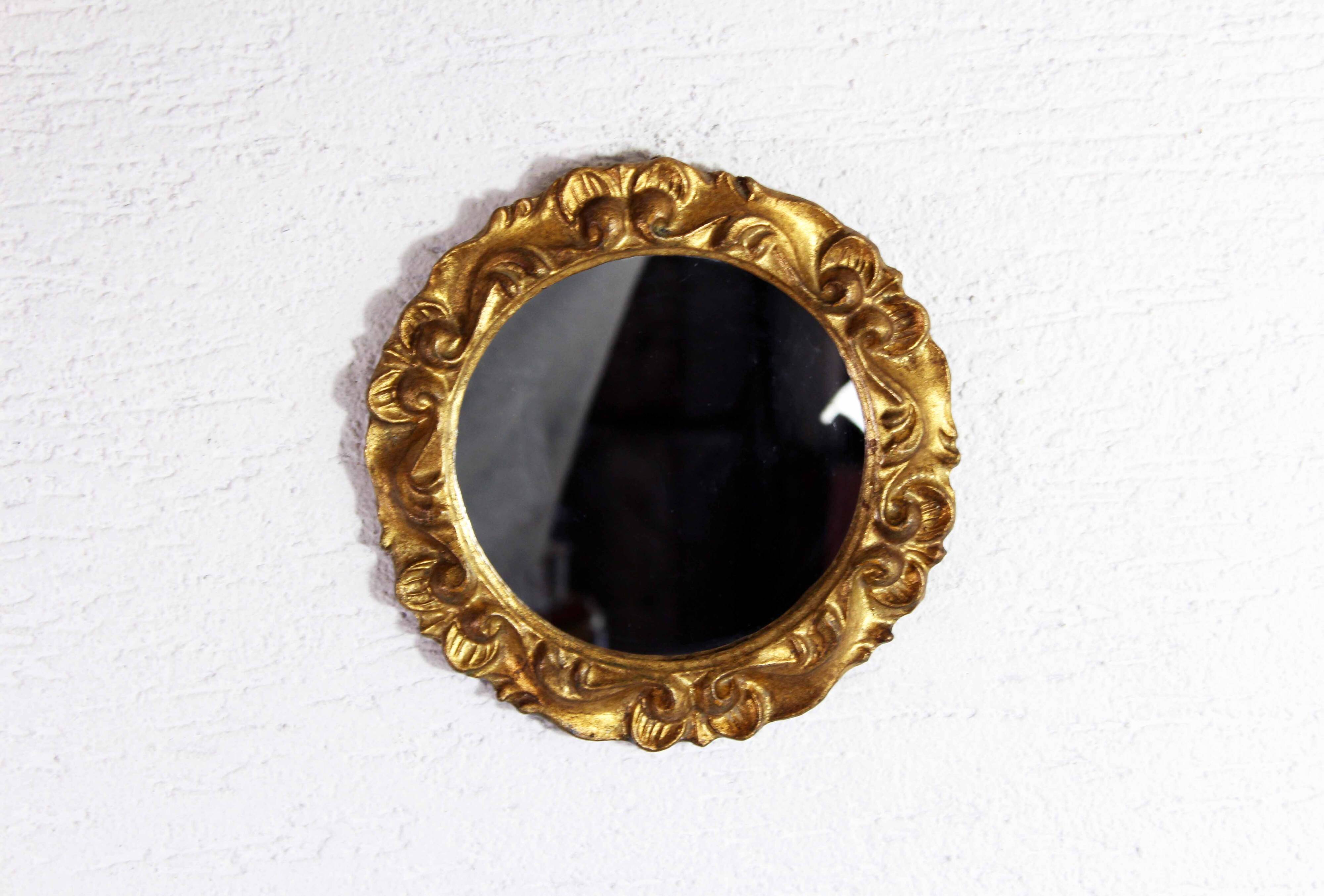 Round gold leaf mirror