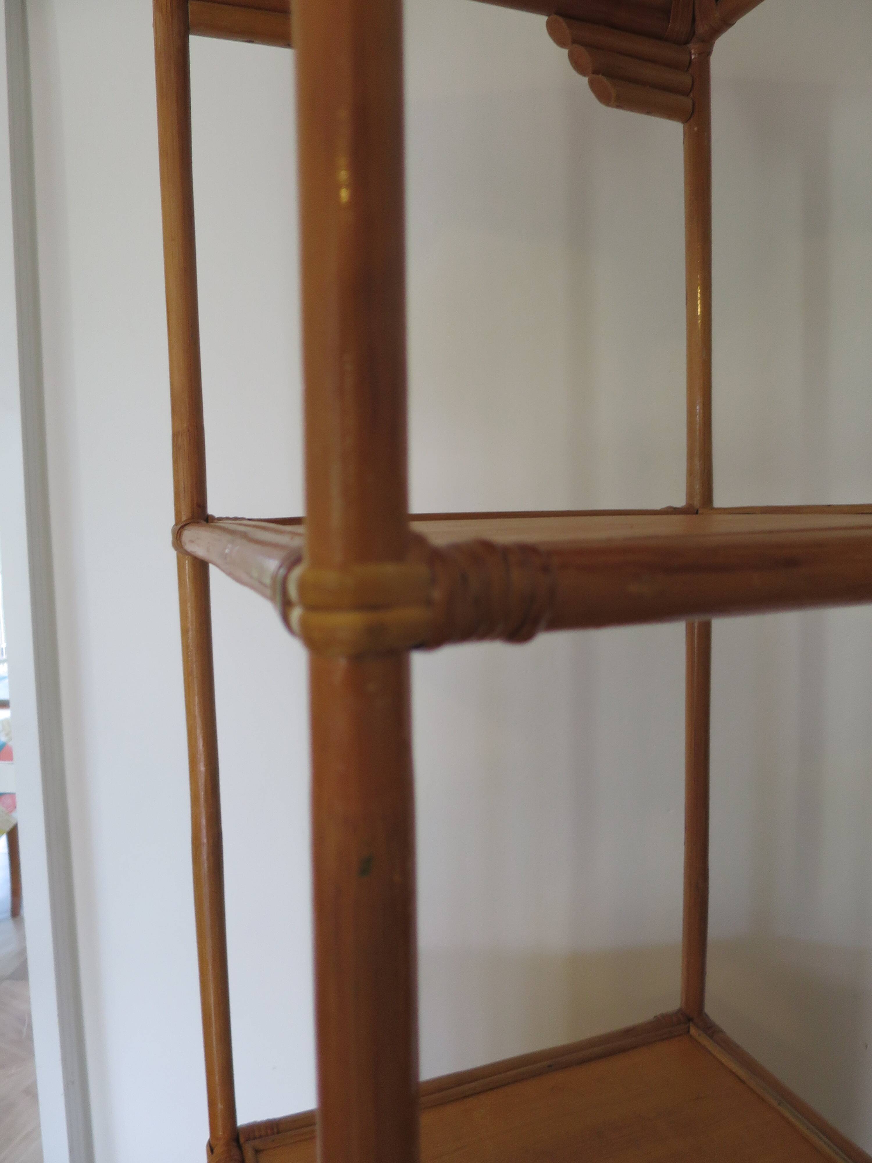 Storage column, wooden bookshelf and woven rattan.