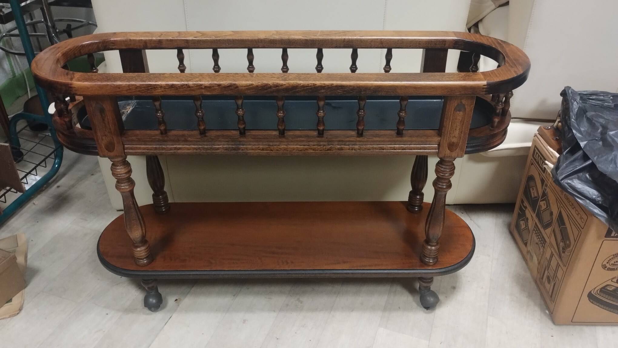 Solid wood planter with two trays on wheels