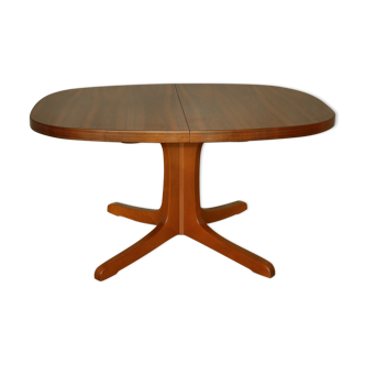 Oval walnut table with extension cords